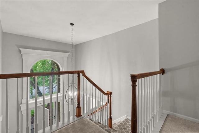 11412 S Lakecrest Dr, Olathe, KS 66061 - stairway featuring carpet floors and baseboards