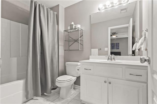 11412 S Lakecrest Dr, Olathe, KS 66061 - full bath featuring vanity, ceiling fan, toilet, tile patterned floors, and shower / bathtub combination with curtain