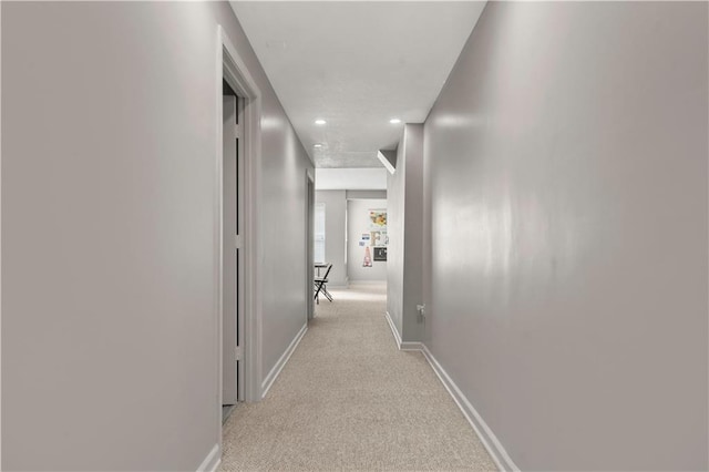 11412 S Lakecrest Dr, Olathe, KS 66061 - hall with light colored carpet, baseboards, and recessed lighting
