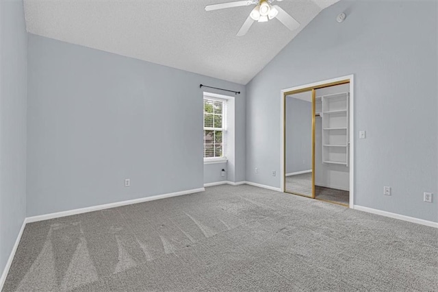 1413 SE Norwood Dr, Lees Summit, MO 64081 - unfurnished bedroom with carpet floors, lofted ceiling, a textured ceiling, baseboards, and a ceiling fan