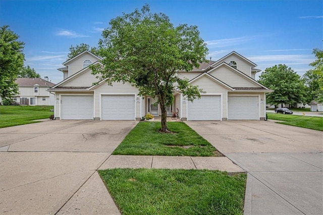 1413 SE Norwood Dr, Lees Summit, MO 64081 - view of front of property with driveway, a garage, and a front yard