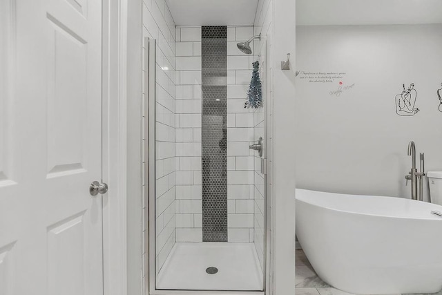 920 S Washington St, Independence, MO 64050 - full bath featuring a shower stall and a soaking tub