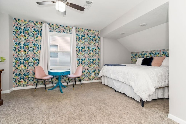 920 S Washington St, Independence, MO 64050 - carpeted bedroom featuring baseboards, wallpapered walls, a ceiling fan, and vaulted ceiling