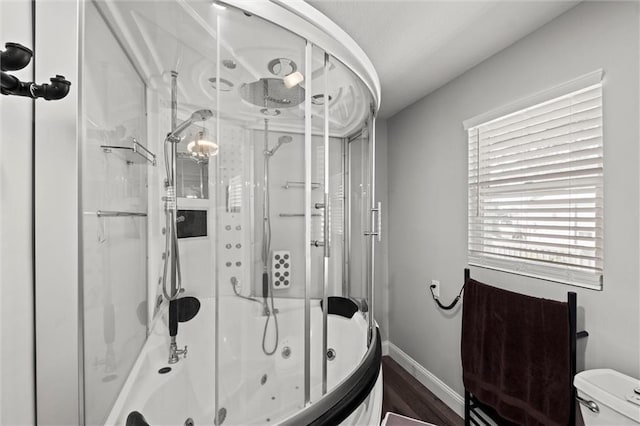 22617 155th St, Basehor, KS 66007 - full bath featuring a combined bath / shower with jetted tub and wood finished floors