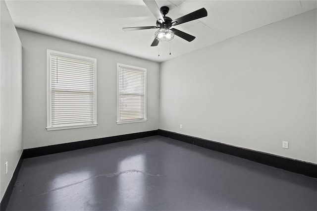22617 155th St, Basehor, KS 66007 - empty room with concrete floors and a ceiling fan