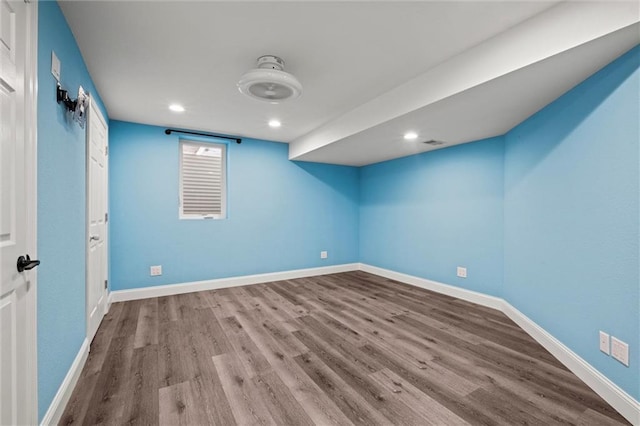 22617 155th St, Basehor, KS 66007 - empty room with wood finished floors and recessed lighting