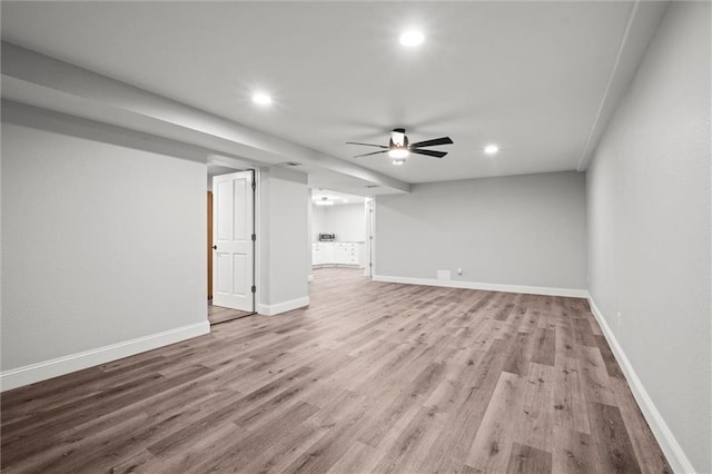 22617 155th St, Basehor, KS 66007 - unfurnished living room with wood finished floors, recessed lighting, and a ceiling fan