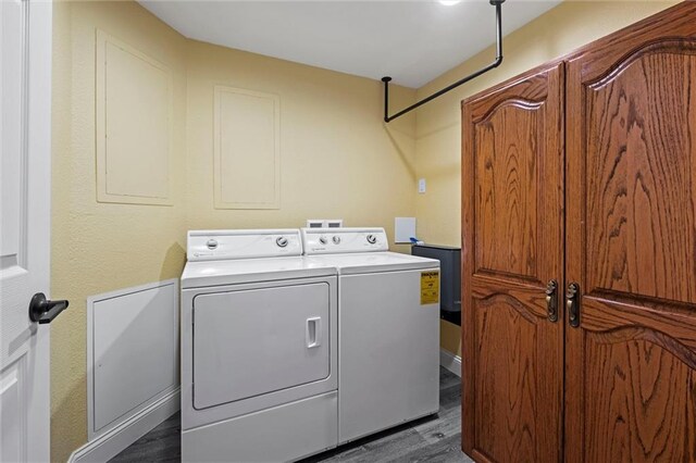 22617 155th St, Basehor, KS 66007 - washroom featuring independent washer and dryer and dark wood-style floors