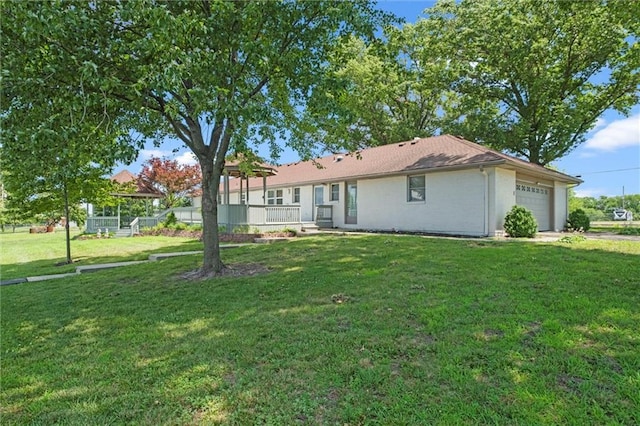 22617 155th St, Basehor, KS 66007 - rear view of property with an attached garage and a lawn