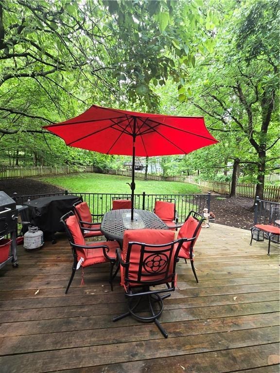 13810 W 53rd St, Shawnee, KS 66216 - wooden terrace featuring outdoor dining area