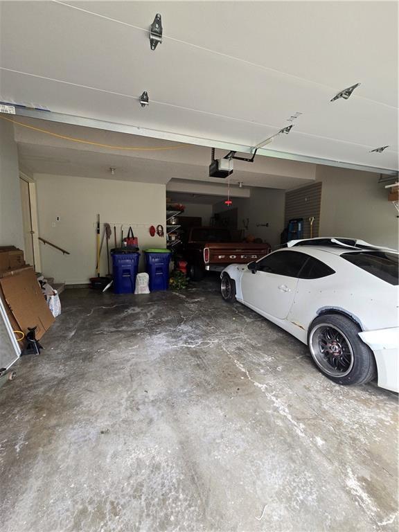 13810 W 53rd St, Shawnee, KS 66216 - garage with a garage door opener