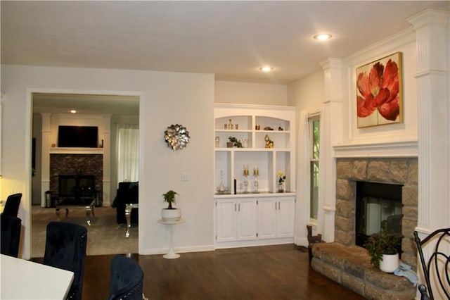 13810 W 53rd St, Shawnee, KS 66216 - living area with a fireplace, dark wood finished floors, and recessed lighting