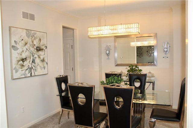 13810 W 53rd St, Shawnee, KS 66216 - carpeted dining area featuring ornamental molding and a chandelier