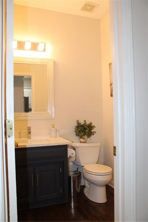 13810 W 53rd St, Shawnee, KS 66216 - bathroom with vanity and wood finished floors