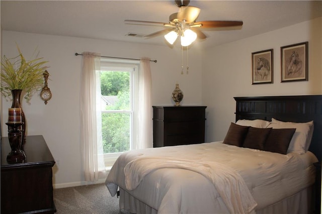 13810 W 53rd St, Shawnee, KS 66216 - carpeted bedroom with a ceiling fan and baseboards