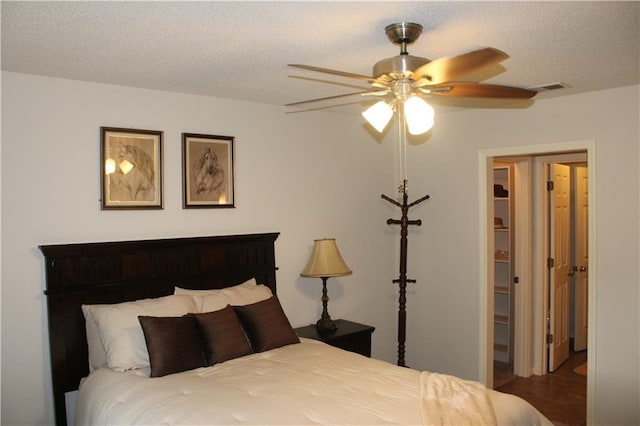 13810 W 53rd St, Shawnee, KS 66216 - bedroom with a textured ceiling and a ceiling fan