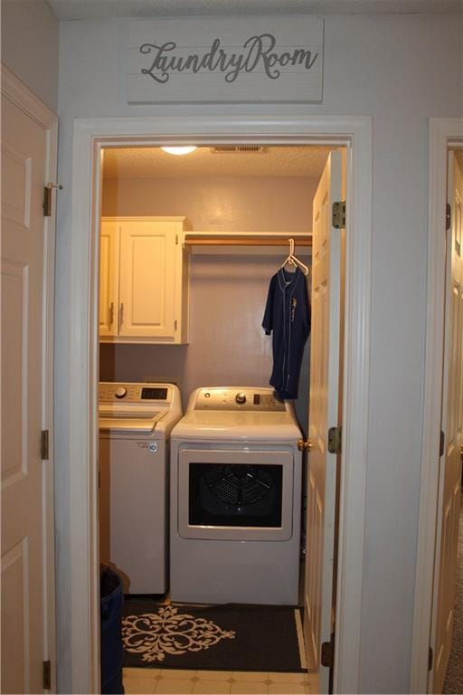 13810 W 53rd St, Shawnee, KS 66216 - laundry room with cabinet space and washer and dryer