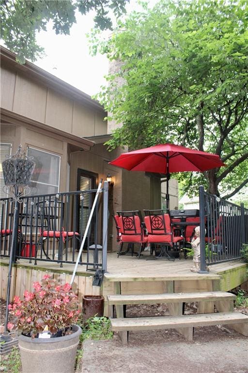 13810 W 53rd St, Shawnee, KS 66216 - deck featuring outdoor dining space