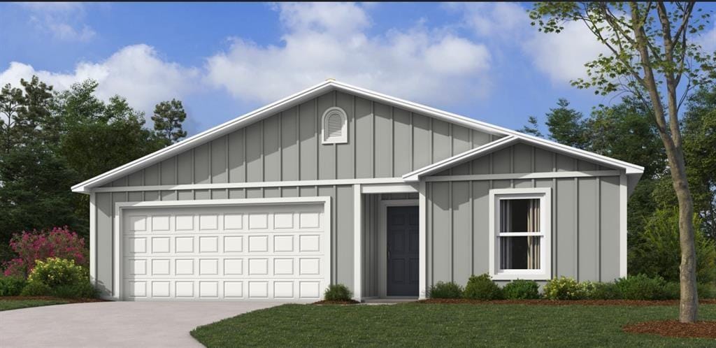 2133 Brook Ridge Cir, Tonganoxie, KS 66086 - ranch-style house featuring board and batten siding, driveway, a garage, and a front yard