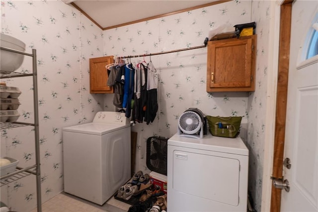 406 Cheyenne Ave, Coffeyville, KS 67337 - laundry room featuring cabinet space, wallpapered walls, washer and clothes dryer, and ornamental molding