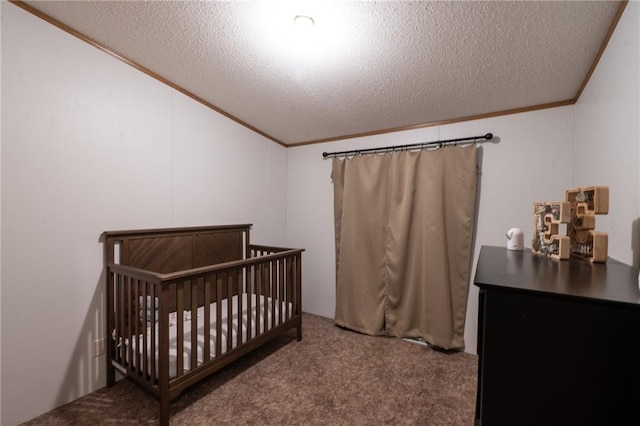 406 Cheyenne Ave, Coffeyville, KS 67337 - carpeted bedroom featuring ornamental molding and a textured ceiling
