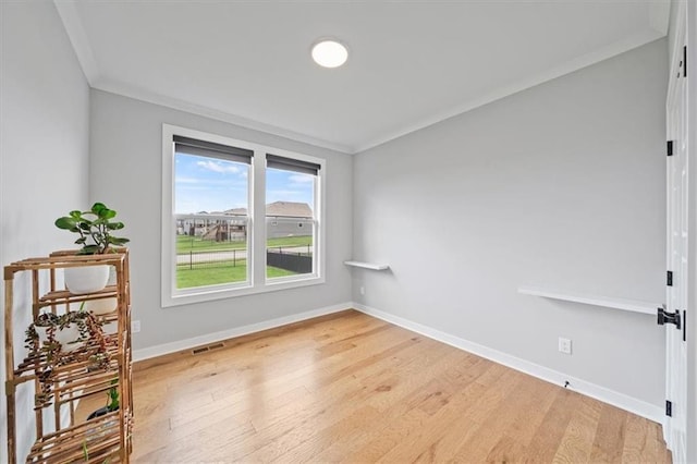 1709 SW Hightown Dr, Lees Summit, MO 64082 - unfurnished room featuring crown molding and light wood-style floors