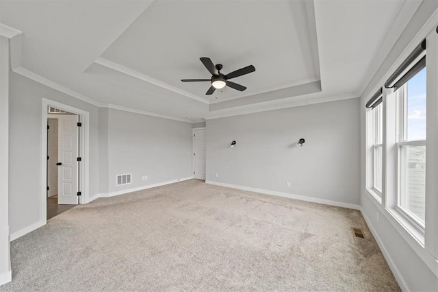 1709 SW Hightown Dr, Lees Summit, MO 64082 - carpeted spare room with a tray ceiling, ceiling fan, and ornamental molding