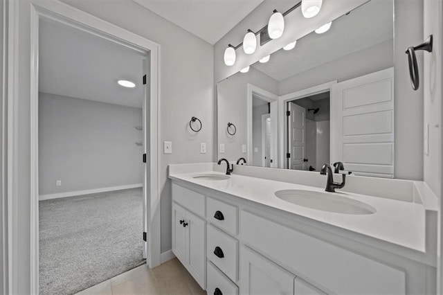 1709 SW Hightown Dr, Lees Summit, MO 64082 - full bathroom with double vanity and tile patterned flooring