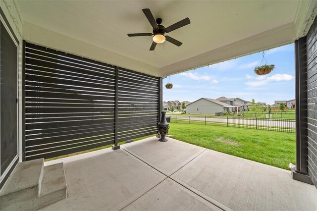 1709 SW Hightown Dr, Lees Summit, MO 64082 - view of patio with ceiling fan and a residential view