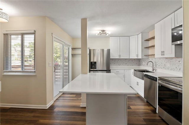 14107 W 88th St, Lenexa, KS 66215 - kitchen featuring appliances with stainless steel finishes, open shelves, decorative backsplash, dark wood finished floors, and white cabinets