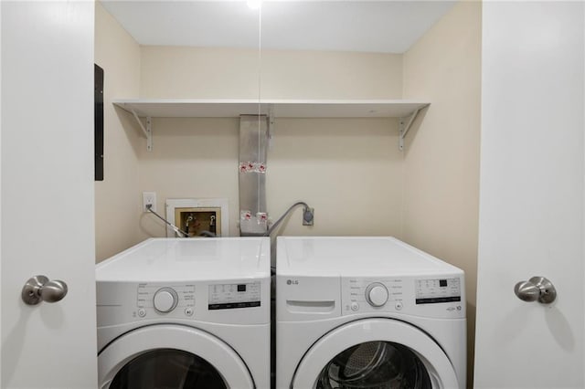 14107 W 88th St, Lenexa, KS 66215 - laundry room featuring separate washer and dryer