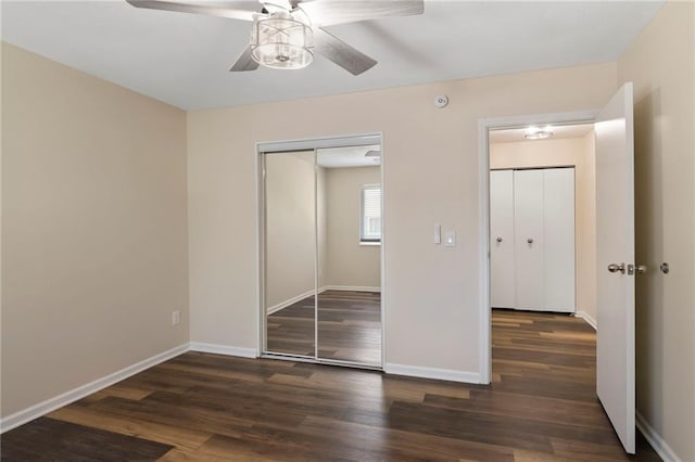14107 W 88th St, Lenexa, KS 66215 - unfurnished bedroom with wood finished floors, a closet, and ceiling fan