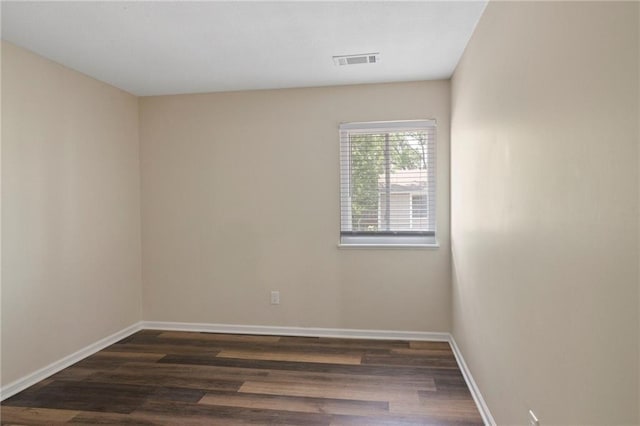 14107 W 88th St, Lenexa, KS 66215 - empty room featuring dark wood-style floors and baseboards