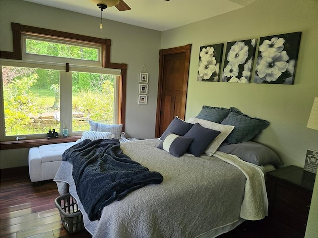 8050 SE Benner Lake Rd, Dearborn, MO 64439 - bedroom with wood finished floors and a ceiling fan