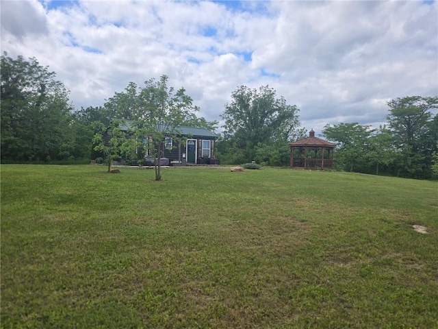 8050 SE Benner Lake Rd, Dearborn, MO 64439 - view of grassy yard with a gazebo