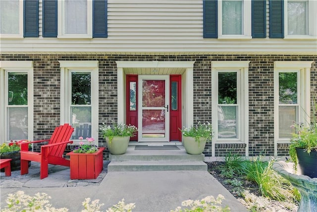 15206 W 85th St, Lenexa, KS 66219 - doorway to property with brick siding