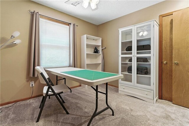 15206 W 85th St, Lenexa, KS 66219 - rec room featuring carpet, a textured ceiling, and a ceiling fan