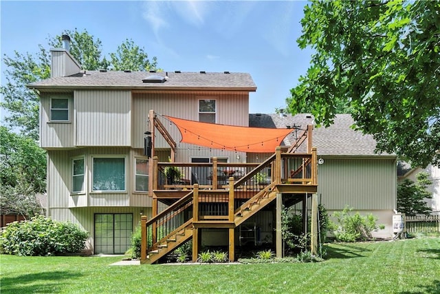 15206 W 85th St, Lenexa, KS 66219 - rear view of house featuring stairs, a wooden deck, a chimney, a lawn, and a shingled roof