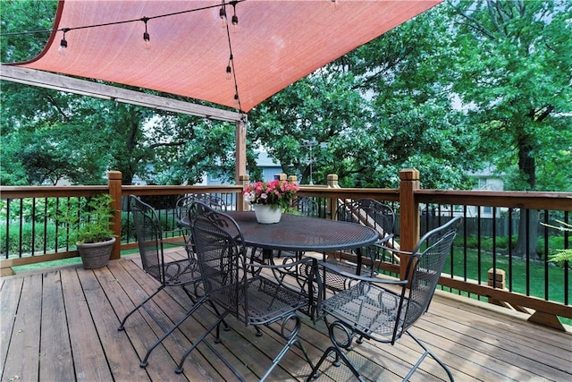 15206 W 85th St, Lenexa, KS 66219 - wooden terrace with outdoor dining area