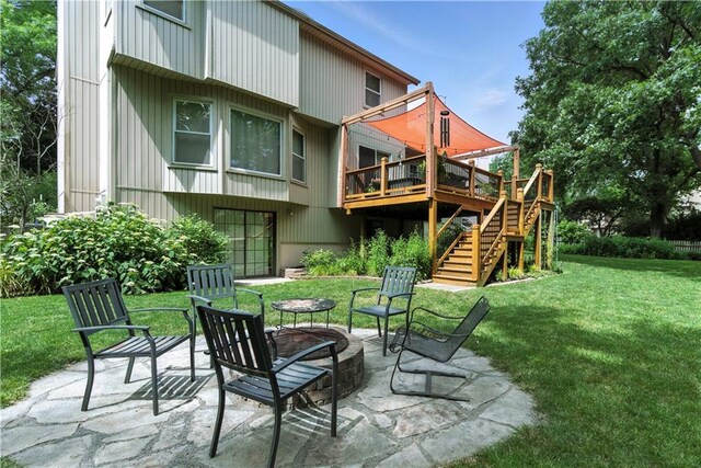 15206 W 85th St, Lenexa, KS 66219 - back of house with stairs, a deck, a patio, a yard, and a fire pit