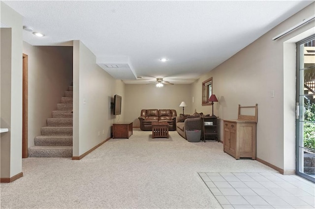 15206 W 85th St, Lenexa, KS 66219 - living room with light colored carpet, stairway, a ceiling fan, and recessed lighting