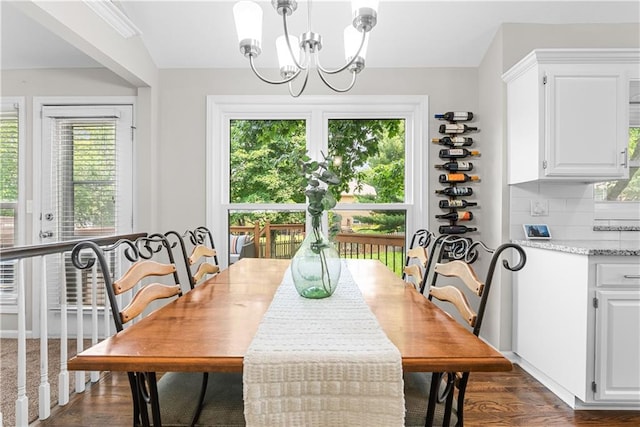 1021 NE Woodbury Ln, Lees Summit, MO 64086 - dining space with plenty of natural light, dark wood-style floors, and a chandelier