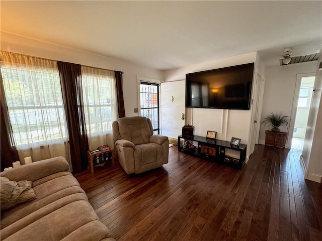 11500 Orchard Rd, Kansas City, MO 64134 - living area with dark wood-style floors
