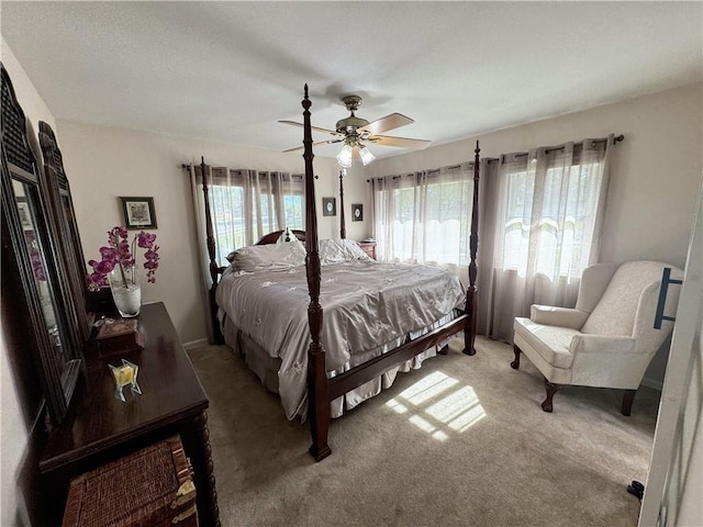 11500 Orchard Rd, Kansas City, MO 64134 - bedroom with light carpet and a ceiling fan