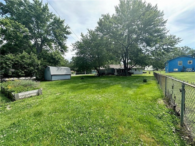 11500 Orchard Rd, Kansas City, MO 64134 - view of yard featuring a vegetable garden
