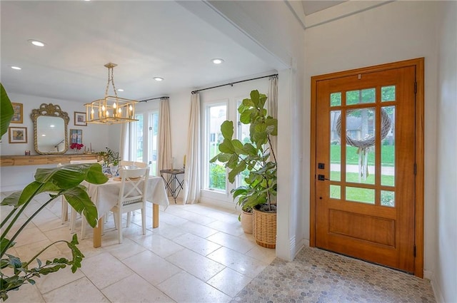 10236 Noland Rd, Lenexa, KS 66215 - entryway with a chandelier, recessed lighting, and baseboards