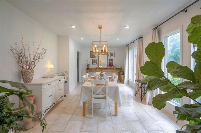 10236 Noland Rd, Lenexa, KS 66215 - dining area with a chandelier and recessed lighting