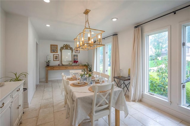 10236 Noland Rd, Lenexa, KS 66215 - dining space featuring a chandelier, recessed lighting, and baseboards
