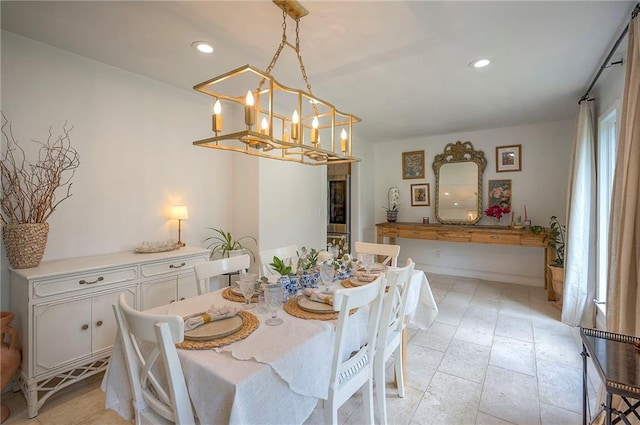 10236 Noland Rd, Lenexa, KS 66215 - dining area with a chandelier, recessed lighting, and baseboards