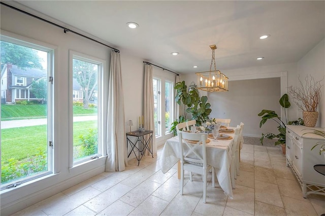 10236 Noland Rd, Lenexa, KS 66215 - dining room with a chandelier, recessed lighting, and baseboards